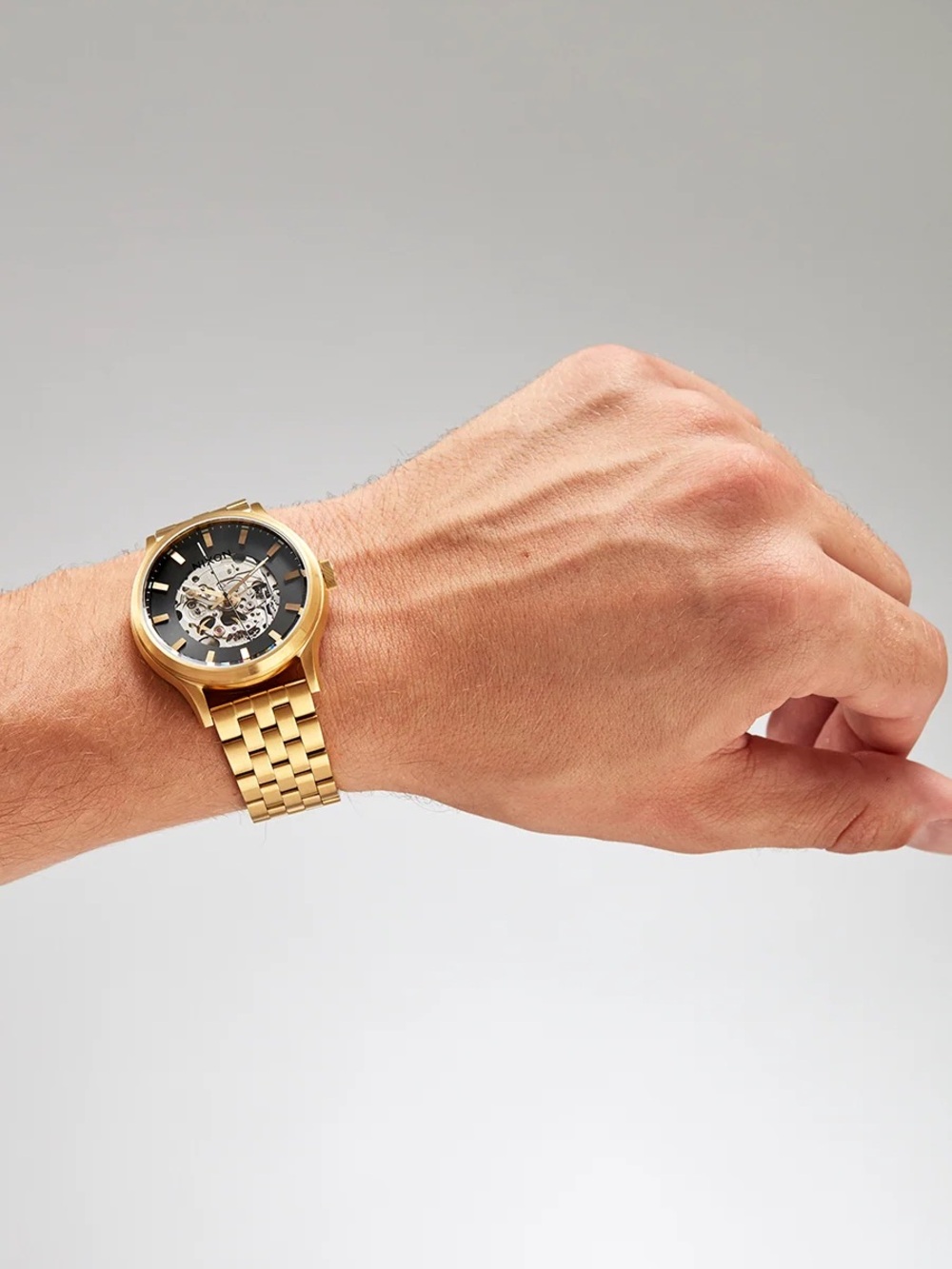 Nixon Spectra: Gold Men’s Skeleton Dial Stainless Steel Bracelet Automatic Watch